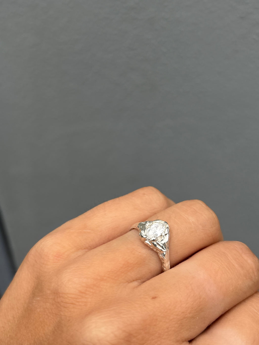 Hand wearing asterling silver ring featuring a marquise cut zirconia handgemachter Ring, Goldring handmade, Unikat Schmuck, lost wax ring, artisan jewelry, unique handmade ring, one of a kind jewelry, boho, modern, raw, minimalist, organic, statement ring, engagement, anniversary, everyday art, for lovers of raw beauty“, „for unique souls