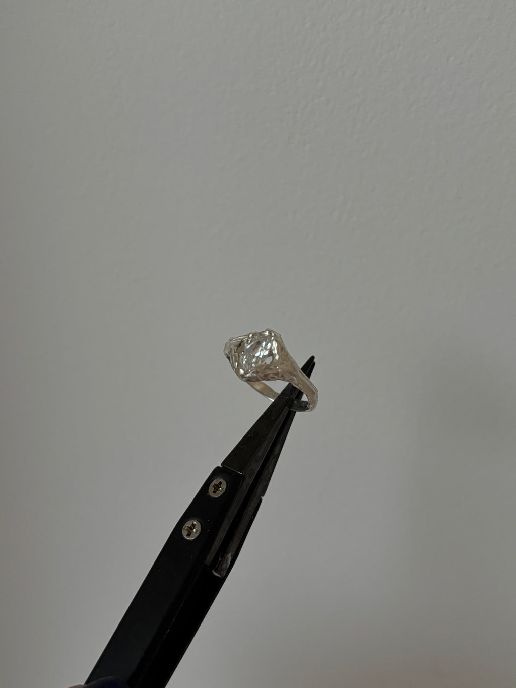 showing a sterling silver ring featuring a marquise cut zirconia