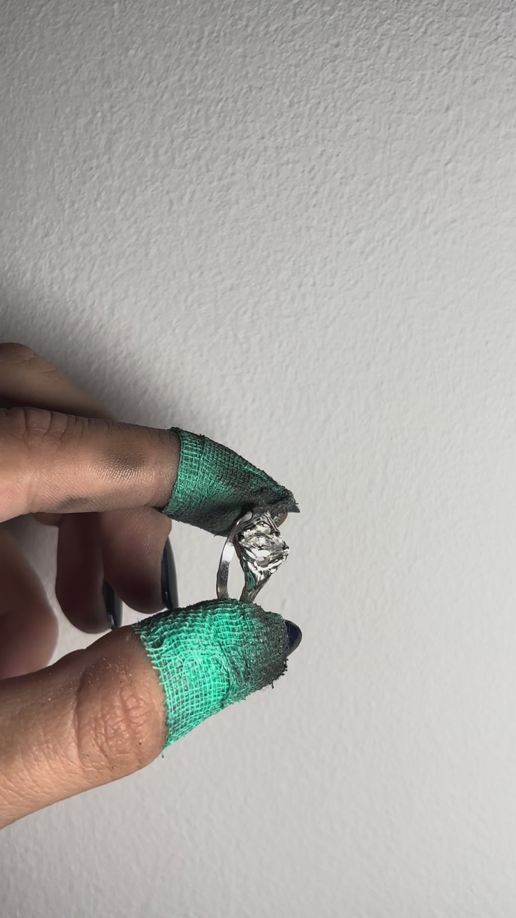 showing a sterling silver ring featuring a marquise cut zirconia